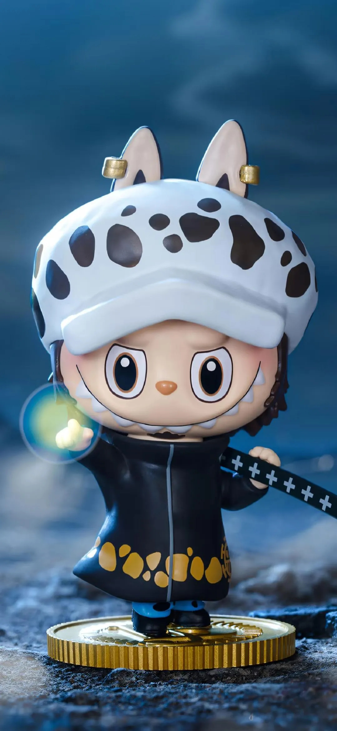 Labubu dressed as Trafalgar D. Water Law from One Piece in spotted hat and black coat